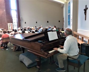 Being back together again means we once more have the support of our much-valued accompanist, Colin Druce (July 2021)